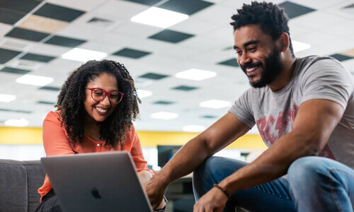 Two people at computer
